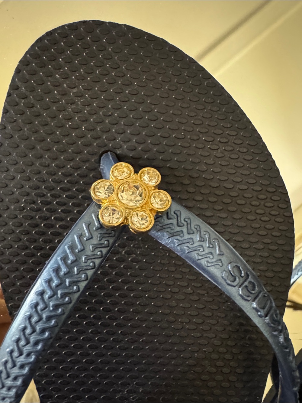 Havaianas Navy Flip Flops with Rhinestone Flower Accent